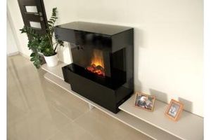 Błyskotliwa aranżacja, czyli kominki  z obudowami malowanymi na wysoki połysk